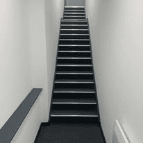 Commercial carpet fitted to a staircase with stair nosings
