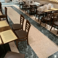 Patterned commercial flooring in a restaurant dining area
